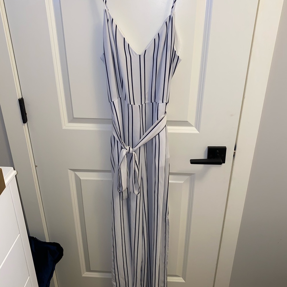 White and black striped jumpsuit with tie waist